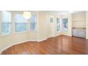 Elegant dining area with hardwood floors and bay window at 10407 Villa View Cir # 10407, Tampa, FL 33647