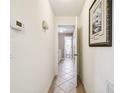 Hallway leading to laundry room and bathroom at 12377 Fillmore St, Spring Hill, FL 34609