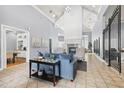 Community room with comfortable seating, fireplace, and dining area at 12904 Sanctuary Cove Dr # 301, Temple Terrace, FL 33637