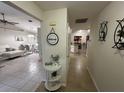 Welcoming entryway with views into living and dining areas at 20102 Lorenzo Ave, Port Charlotte, FL 33952