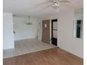 Bright living room featuring tile and wood floors at 642 Bird Bay E Dr # 205, Venice, FL 34285