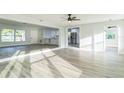 Open concept living room with kitchen view at 1845 Skyland Dr, Clearwater, FL 33759