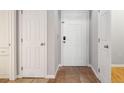 Condo entryway with tile floors and white doors leading to other rooms at 1810 E Palm Ave # 1205, Tampa, FL 33605