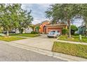 Attractive single-Gathering home with a two-car garage and well-maintained lawn at 612 Marion Hill Ln, Ruskin, FL 33570