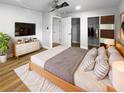 Spacious bedroom with walk-in closet and wood floors at 736 Mac Crillus Rd, Largo, FL 33770