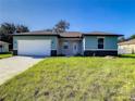 Newly built home with paver driveway at 1543 Mackinaw St, North Port, FL 34286