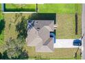 New construction home with driveway at 1543 Mackinaw St, North Port, FL 34286