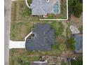 Birds eye view of this single Gathering residence featuring a paver driveway and manicured lawn at 1081 Mccrory St, North Port, FL 34286