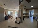 Living room undergoing renovation, showing construction materials at 5833 4Th N Ave, St Petersburg, FL 33710