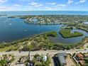 Aerial view showcasing waterfront property and surrounding neighborhood at 3547 6Th S St, St Petersburg, FL 33705