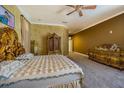 Bright bedroom featuring an ornate bed and matching furniture at 5900 98Th N Ave, Pinellas Park, FL 33782