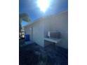 Rear view of house showing AC unit and exterior wall at 6336 Florida Cir, Apollo Beach, FL 33572