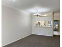 Spacious dining area with a view into the kitchen at 2346 Lake Woodberry Cir, Brandon, FL 33510