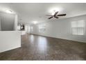 Bright and airy living room featuring tile floors and ample natural light at 8863 White Sage Loop, Lakewood Ranch, FL 34202