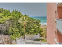 Peaceful ocean view from private patio, lush landscaping at 18400 Gulf Blvd # 1206, Indian Shores, FL 33785