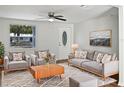 Bright living room featuring neutral tones and modern furnishings at 10009 Connecticut St, Gibsonton, FL 33534