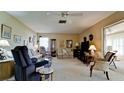 Spacious living room with carpeted floors and ample seating at 6809 9Th W Ave # 0, Bradenton, FL 34209