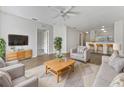Inviting living room with stylish furniture, wood floors, and an open layout at 2061 Willow Hammock Cir # 107, Punta Gorda, FL 33983