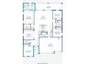 Open-concept floor plan featuring a great room, kitchen, dining area, and a three-car garage at 11435 Petrel Ave, Weeki Wachee, FL 34614
