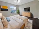 Main bedroom with a dresser and plenty of space at 6629 Pineview Ter # 5-201, Bradenton, FL 34203