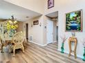 Formal dining room with ornate furniture and large windows at 7319 Lagoon Rd, Spring Hill, FL 34606