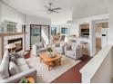 Bright living room with fireplace and comfortable seating at 2364 Hanover Dr, Dunedin, FL 34698