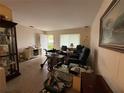 Living room with entryway and neutral decor at 6002 Town N Country Blvd, Tampa, FL 33615