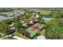 Community with basketball courts and green spaces at 1078 Signet Dr, Apollo Beach, FL 33572