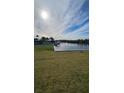 Waterfront lot with river views and neighboring houses at 1078 Signet Dr, Apollo Beach, FL 33572