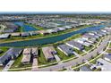 Expansive aerial view of the community and surrounding waterways and landscaping at 4621 Mondrian Ct, Sarasota, FL 34240