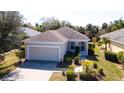 Charming one-story home with a two-car garage and well-manicured landscaping at 5320 Aqua Breeze Dr, Bradenton, FL 34208