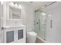 Modern bathroom featuring a glass-enclosed shower, updated fixtures, and a sleek vanity at 4604 Hunts Ave, Plant City, FL 33566