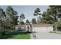 Beautiful one-story home with a three-car garage, lush landscaping, and towering trees in a serene setting at 15945 Viscount Cir, Port Charlotte, FL 33981