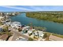 Beautiful waterfront home with boat dock and stunning views of the surrounding area at 318 182Nd E Ave, Redington Shores, FL 33708