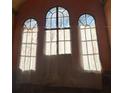 Unique set of arched windows, providing potential for natural light and distinctive charm at 1827 2Nd E Ave, Bradenton, FL 34208