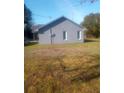 Simple single story home with a well-maintained lawn and tidy exterior at 4375 Neff Lake Road, Brooksville, FL 34601