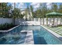 Beautiful backyard pool with stepping stones and landscaping with bamboo accents at 1056 Snell Isle Ne Blvd, St Petersburg, FL 33704