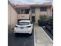 Well-maintained condo building featuring assigned parking and a tidy exterior at 4780 Brittany S Dr # 111, St Petersburg, FL 33715