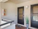 Inviting front entrance featuring modern black doors and a sleek, contemporary design at 4780 Brittany S Dr # 111, St Petersburg, FL 33715