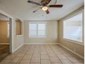 Bright living room features neutral walls, tiled floors, and ample natural light at 2011 10Th S St, St Petersburg, FL 33705