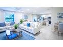 Bright and airy living room featuring stylish furniture and an open-concept design at 5048 Silver Bell Dr, Port Charlotte, FL 33948