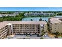 Condo exterior with ample parking, well-maintained facade and waterfront location at 3672 Lake Bayshore Dr # K327, Bradenton, FL 34205
