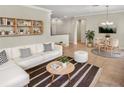 Bright living room featuring modern decor, stylish furnishings, and an open layout at 5485 Sunset Falls Dr, Apollo Beach, FL 33572