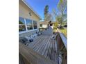 Exterior deck has debris, including broken railings and building materials at 1810 New Hampshire Ne Ave, St Petersburg, FL 33703
