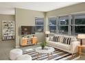 Bright living room with plenty of natural light and modern furnishings at 301 Francis Dr, Apollo Beach, FL 33572