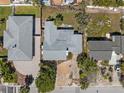 Birds eye view of the home showcasing the roof, driveway and proximity to neighboring homes at 437 79Th Ave, St Pete Beach, FL 33706