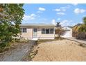 Charming single-story home featuring a well-maintained exterior and a cozy front yard at 437 79Th Ave, St Pete Beach, FL 33706
