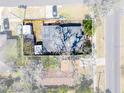 Aerial view of the property showcasing the lot size, surrounding neighborhood, and roof condition at 8608 N 20Th St, Tampa, FL 33604