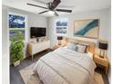 Comfortable bedroom with natural light, ceiling fan, and stylish decor at 4800 86Th N Ave, Pinellas Park, FL 33782