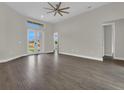 The living space features modern tile flooring and bright, natural light at 15741 Autry Cir, Port Charlotte, FL 33981